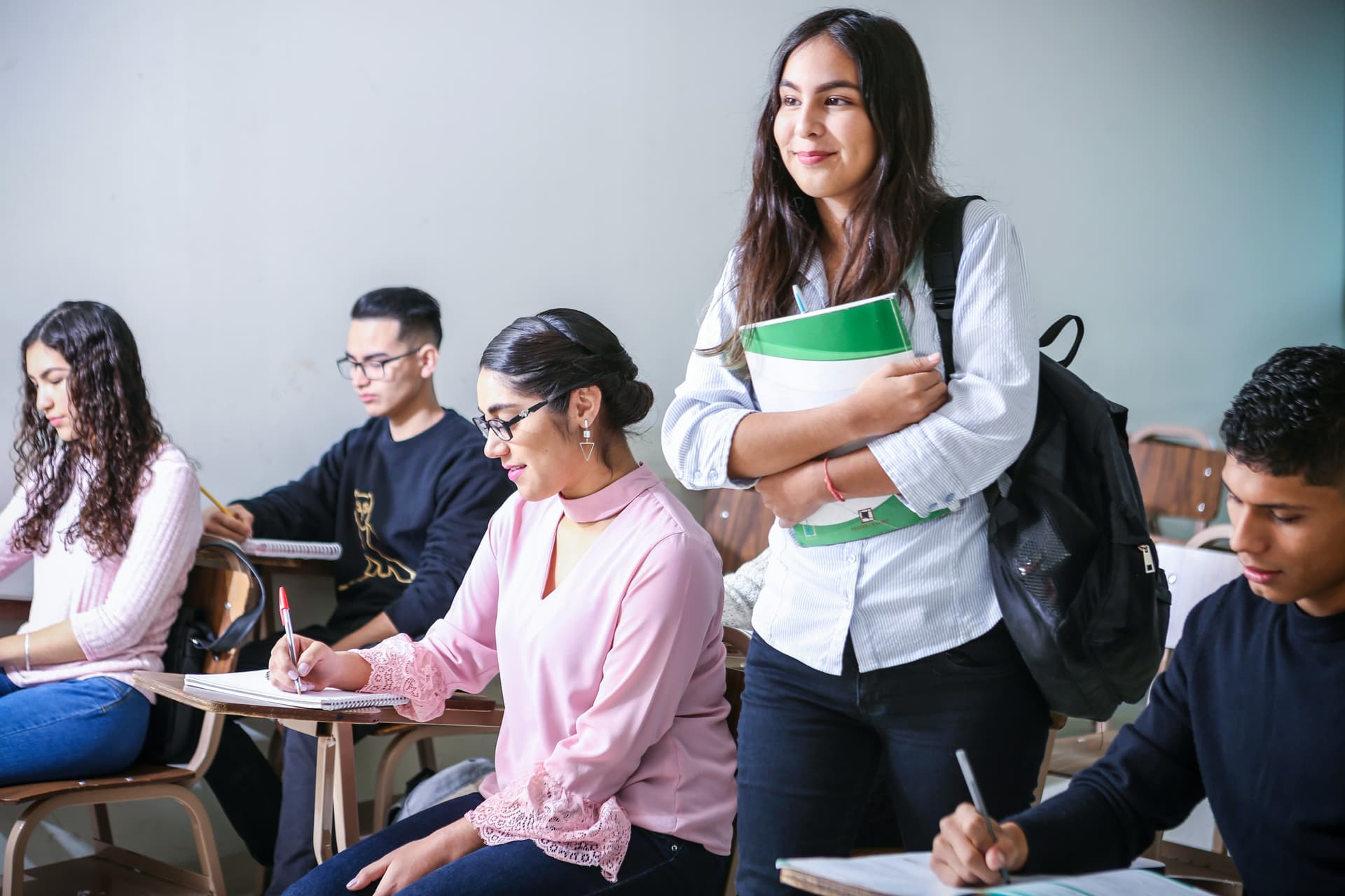 Confident college student with backpack
